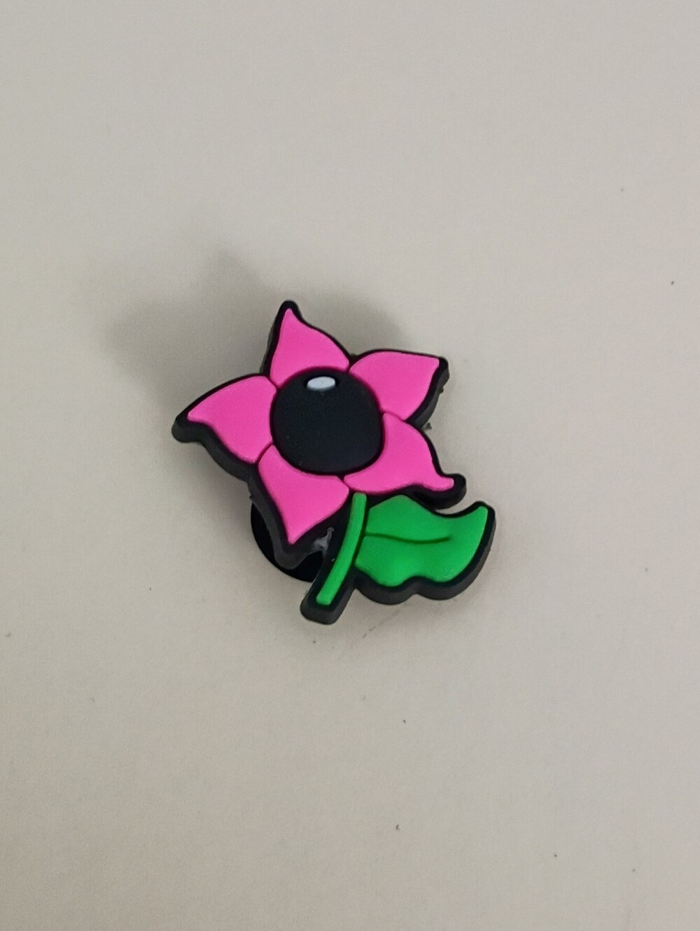 10 for $10 Jibbitz Croc Charm - Pink Flower With Black Pistol Green Stem & Leaf